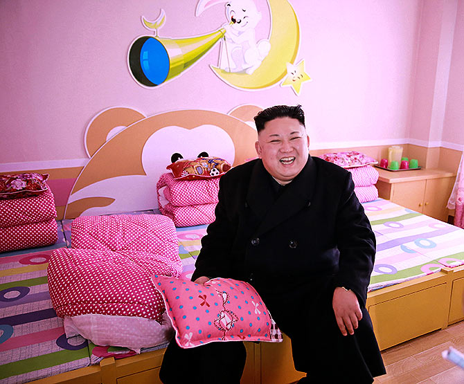 North Korea's leader Kim Jong-un at the Pyongyang Orphans Primary School. Photograph: Korean Central News Agency/Reuters