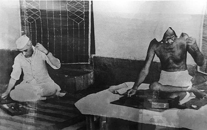 Gandhi ad Nehru spin the charkha