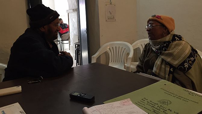 Colonel Cheema listens to a mother who has not received the dues after the death of her 23-year-old son, a lieutenant. Photograph: Archana Masih/Rediff.com