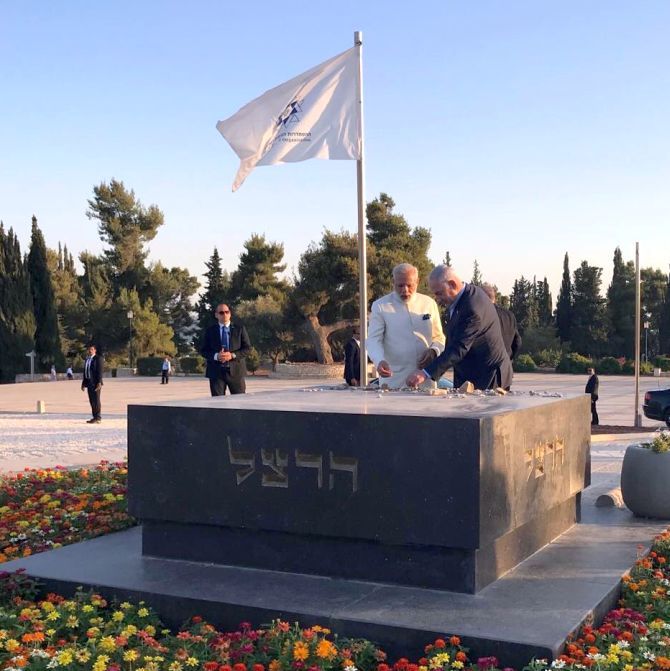 Prime Minister Narendra Modi and Israel's Prime Minister Benjamin Netanyahu at the grave of Theodor Herzl, considered the father of the State of Israel, June 4, 2017. Photograph: @netanyahu/Twitter