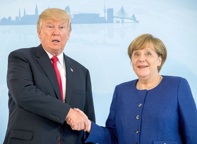 US President Donald J Trump with German Chancellor Angela Merkel at the G20 Summit in Hamburg, July 6, 2017. Photograph: Matthias Schrader/Pool/Reuters