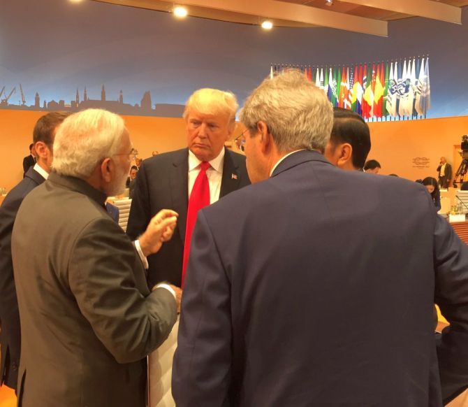 Prime Minister Narendra D Modi chats with US President Donald J Trump at the G-20 summit in Hamburg, July 8, 2017. Photograph: Kind courtesy Arvind Panagariya