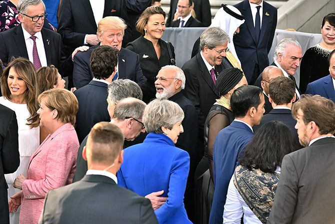 Prime Minister Narendra Damodardas Modi with United States President Donald John Trump and Canadian Prime Minister Justin Trudeau at the G-20 summit in Hamburg, July 7, 2017. Photograph: Press Information Bureau