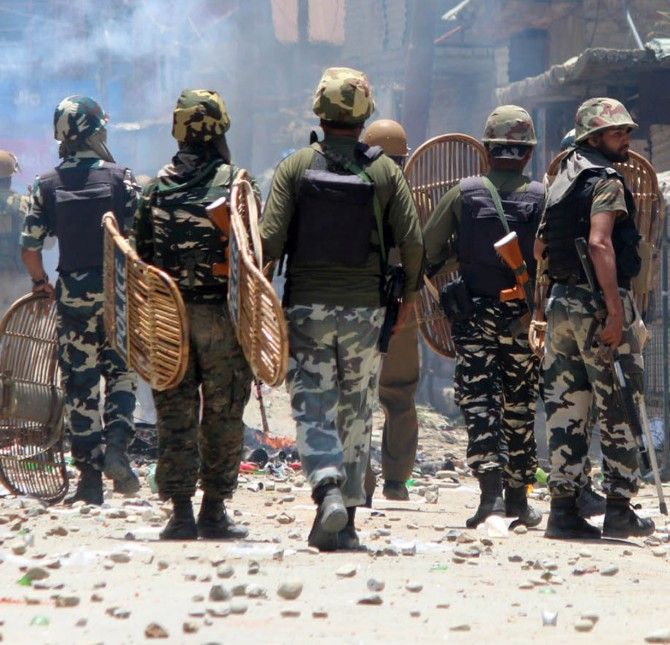 Soldiers have to deal with terrorists as well as stone pelters at encounter sites, this one on June 16, 2017 in Kashmir. Photograph: Umar Ganie