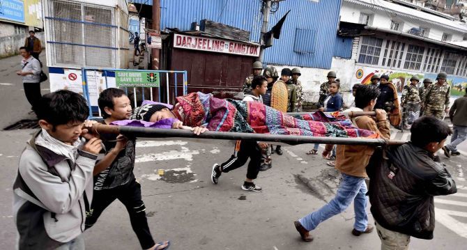 People carry a patient to hospital during the indefinite bandh in Darjeeling. Photograph: Ashok Bhaumik/PTI Photo