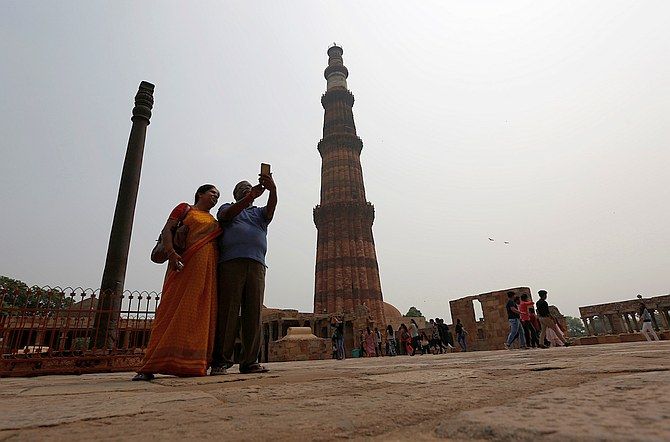 Visitors at Delhi's Qutub Minar