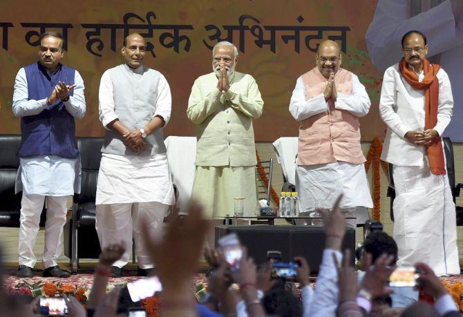 Narendra Modi with BJP President Amit Shah, Union Ministers Ananth Kumar, Rajnath Singh and M Venkaiah Naidu at the party headquarters, March 12, 2017. Photograph: Kamal Singh/PTI Photo