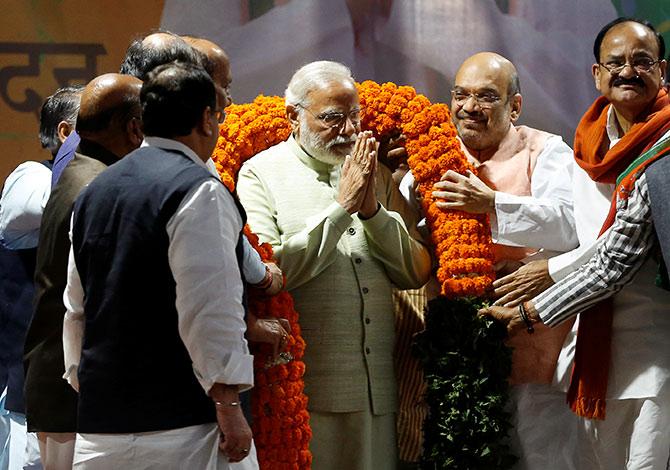 Prime Minister Narendra Modi being felicitated after the Bharatiya Janata Party victory in Uttar Pradesh