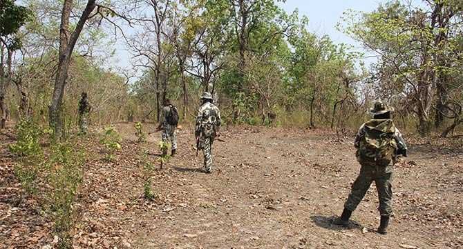 Jawans of the CRPF's 74th battalion enter a forested patch on an area domination exercise on the afternoon of May 5. On April 24, 25 jawans of the same battalion were gunned down by the Maoists in the jungle opposite Burkapal village