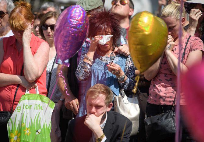 Britain Unites In Silence To Pay Tribute To Manchester Victims - Rediff ...