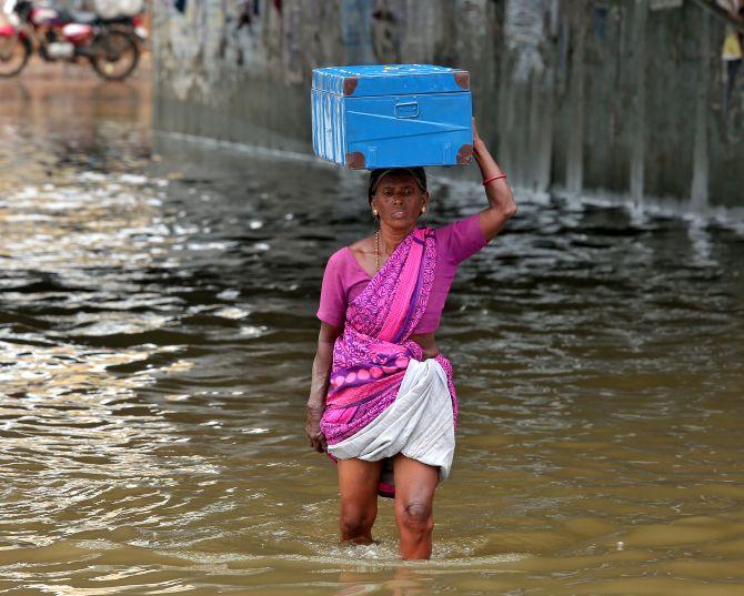 A woman wades through a water-logged subway after rains in Chennai, November 3, 2017. Photograph: P Ravikumar/Reuters