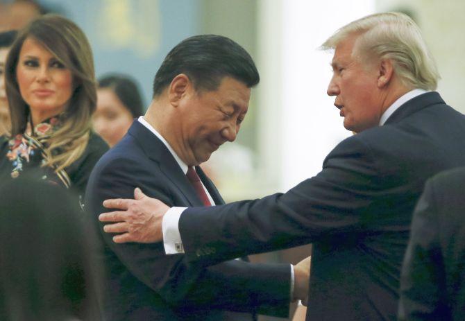 China's President Xi Jinping and US President Donald J Trump at a State dinner at the Great Hall of the People, Beijing, November 14, 2017. Photograph: Thomas Peter/Pool/Getty Images