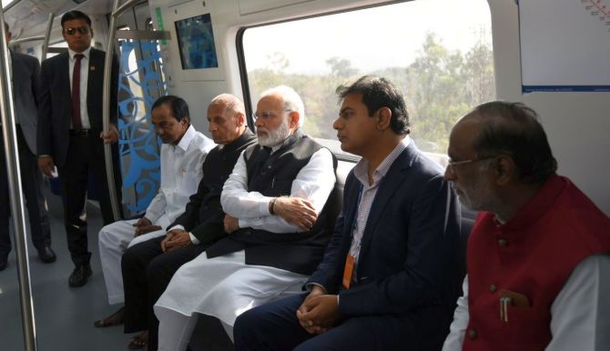 Prime Minister Narendra D Modi with to his right Telangana Governor E S L Narasimhan and Chief Minister K Chandrashekhar Rao at the inauguration of the Hyderabad Metro, November 28. Photograph: PIB_India/Twitter