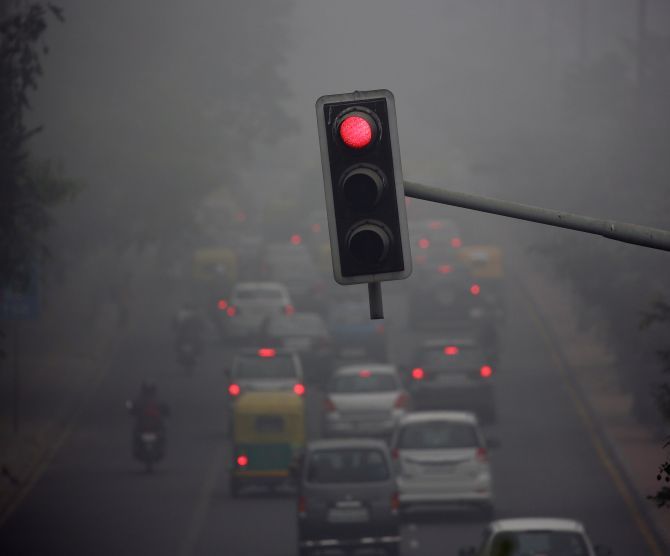 Visibility is just 200 metres on this Delhi road. Photograph: Cathal McNaughton/Reuters