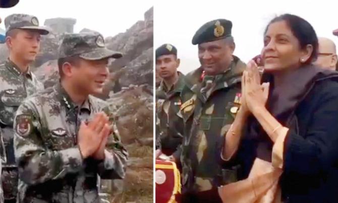 Defence Minister Nirmala Sitharaman exchanges a namaste with Chinese troops, October 8, 2018, during her maiden visit to the Nathu La border post in Sikkim