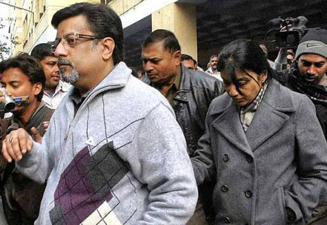 Dr Nupur Talwar and her husband Dr Rajesh Talwar at the court in Ghaziabad. Photograph: Reuters