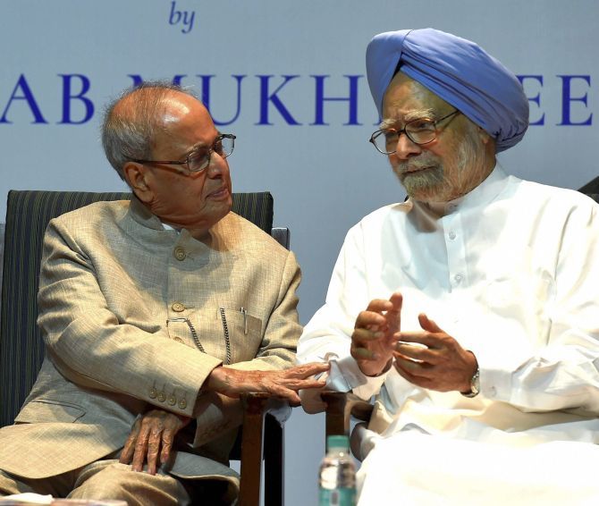 Former President Pranab Mukherjee with former prime minister Manmohan Singh at the book release function in New Delhi, October 13, 2017. Photograph: Atul Yadav/PTI Photo