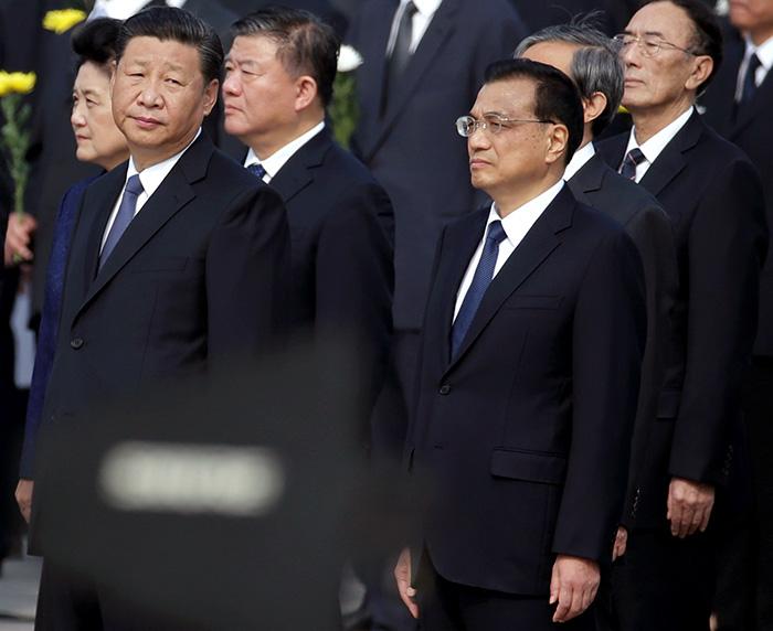 Chinese President Xi Jinping and Premier Li Keqiang attend a ceremony at the Monument to the People's Heroes at Tiananmen Square, September 30, 2017. Photograph: Jason Lee/Reuters