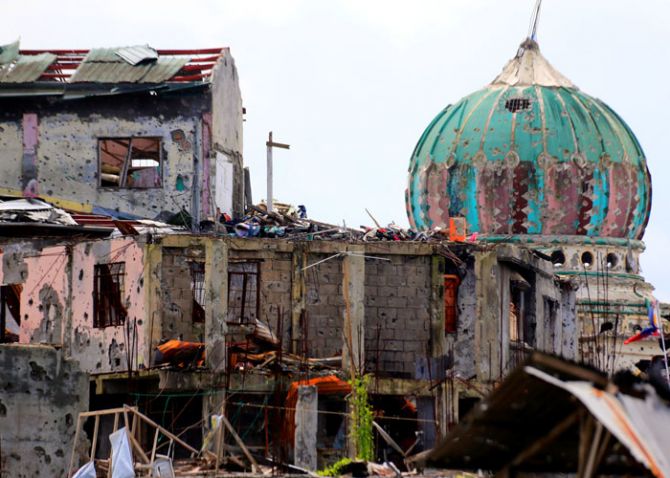 Damaged buildings after government troops cleared the area of pro-Islamic State terror groups inside Saduc, Marawi city, southern Philippines, October 22, 2017. Photograph: Romeo/Reuters