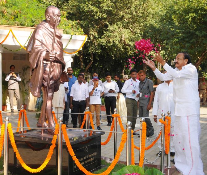 VP Naidu unveils Rs 8.73 lakh Gandhi statue at Rajghat - Rediff.com ...