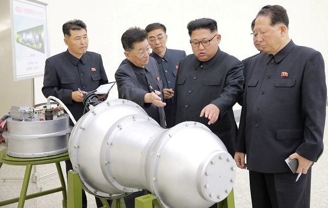 Kim Jong Un inspects a nuclear device in Pyongyang, September 3, 2017. Photograph: KCNA via Reuters