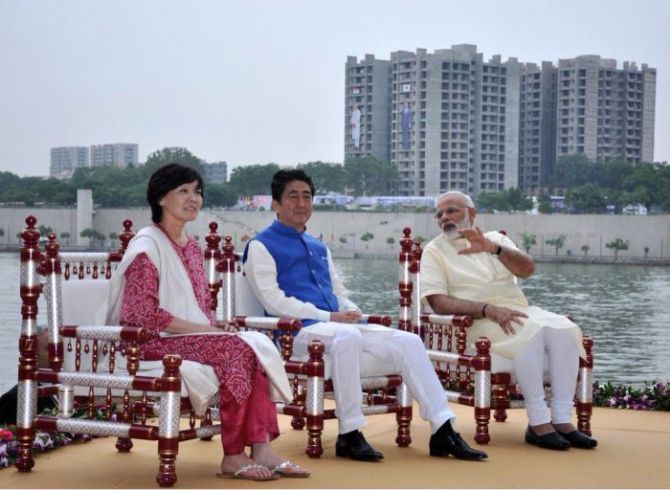 Japan's Prime Minister Shinzo Abe and his wife Akie with Prime Minister Narendra D Modi at the Sabarmati riverfront in Ahmedabad, September 14, 2017. Photograph: @MEAIndia/Twitter