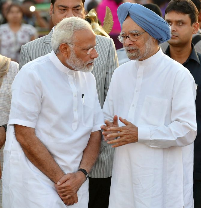 Prime Minister Narendra D Modi with former prime minister Dr Manmohan Singh at the Dussehra celebrations at the Parade Ground, New Delhi, September 30, 2017. Photograph: Kamal Kishore/PTI Photo