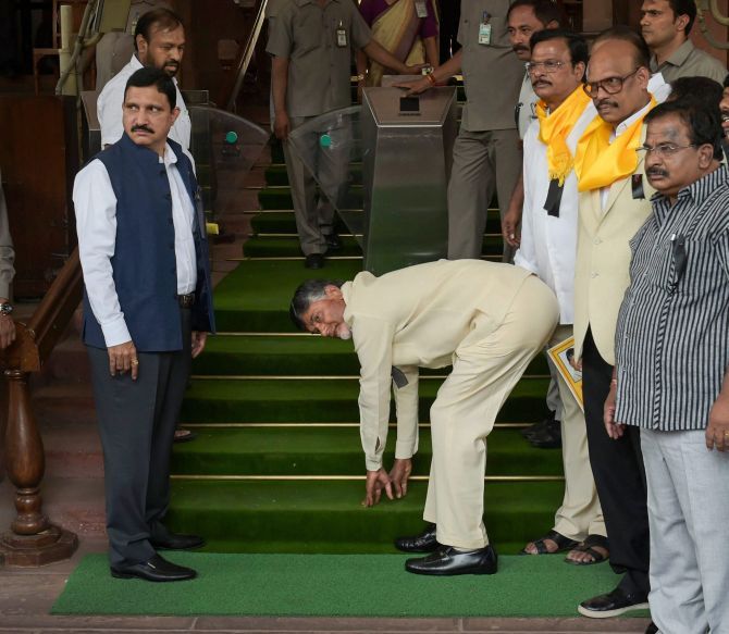 April 3, 2018. On his first visit to New Delhi after breaking away from the NDA, Andhra Pradesh Chief Minister Nara Chandrababu Naidu touched the stairs before entering Parliament. Naidu's act wass reminiscent of what Prime Minister Narendra Damodardas Modi did when he entered Parliament for the first time as a MP in 2014. Photograph: Shahbaz Khan/PTI Photo