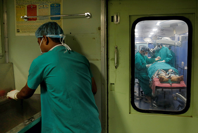 Surgery aboard the Lifeline Express. Photographs: Danish Siddiqui/Reuters