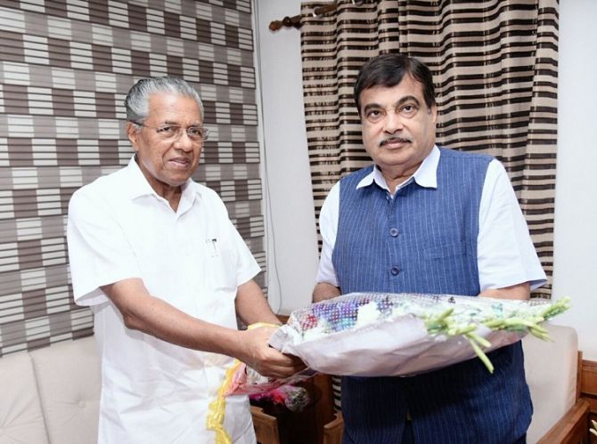  Kerala Chief Minister Pinarayi Vijayan, left, with Union Minister Nitin Gadkari in Thiruvanathapuram, March 28, 2018.
