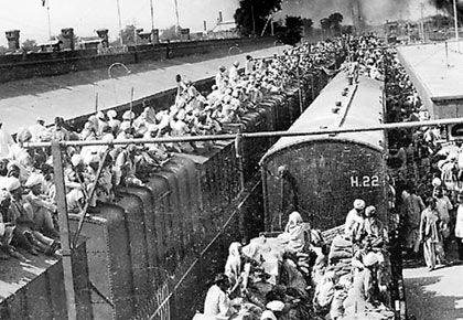 Sikhs flock aboard a train to India to escape the violence of the Partition riots after the bifurcation of Punjab