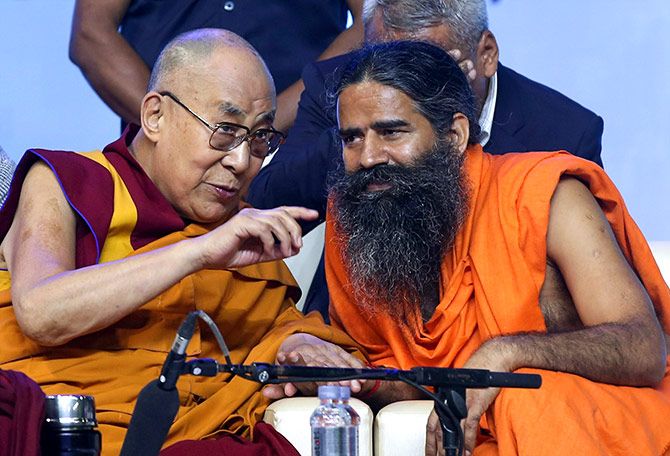 His Holiness the Dalai Lama and Baba Ramdev at the World Peace and Harmony conclave in Mumbai, August 13, 2017. Photograph: Shailesh Andrade/Reuters