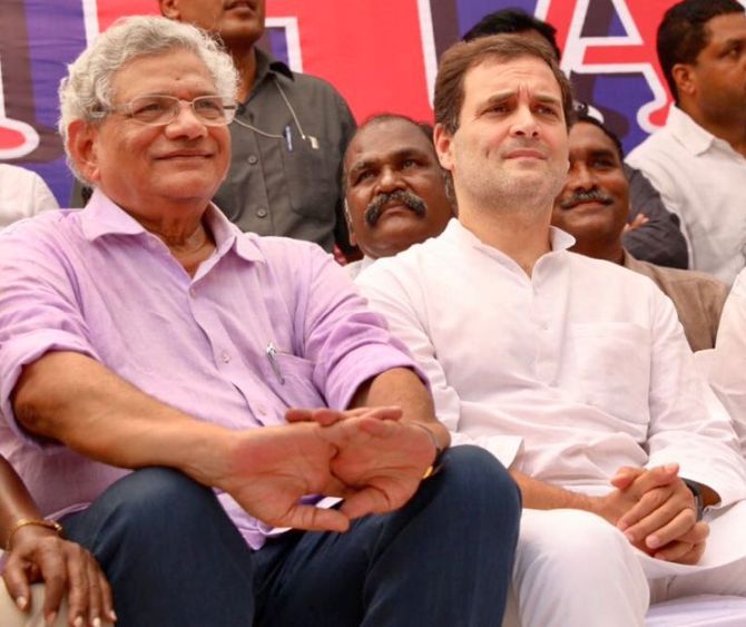 Congress President Rahul Gandhi, right, with Communist Party of India-Marxist General Secretary Sitaram Yechury