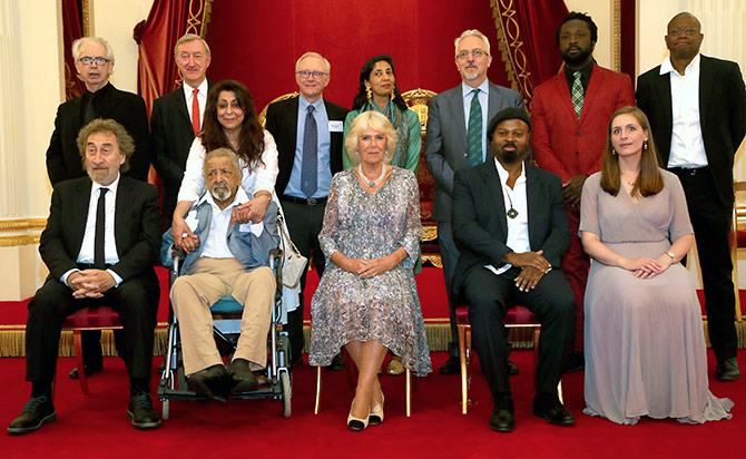 Sir V S Naipaul and Lady Nadira with the Duchess of Cornwall and other Man Booker Prize winners: (Back row, left to right) Peter Carey, Julian Barnes, David Grossman (a former Man Booker International winner), Kiran Desai, Alan Hollinghurst, Marlon James, Paul Beatty; (front row, left to right) Howard Jacobson, V S Naipaul (accompanied by his wife Nadira), Ben Okri and Eleanor Catton at a reception celebrating the 50th anniversary of the Man Booker Prize at Buckingham Palace, July 5, 2018. Photograph: Gareth Fuller/Reuters  