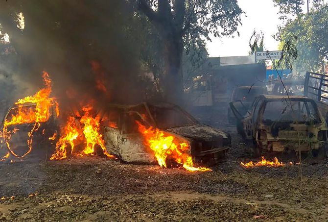 Vehicles set on fire by a mob during the riot in Uttar Pradesh's Bulandshahr district, December 3, 2018. Photograph: PTI Photo