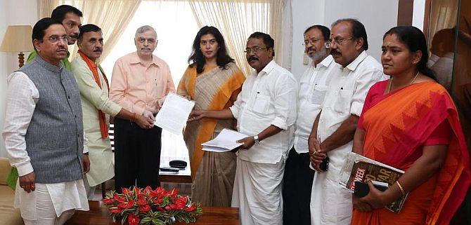 Muraleedharan, third from right