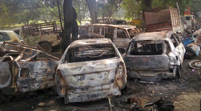 Charred vehicles set on fire by a mob in Monday's violent clashes over the alleged illegal slaughter of cattle in Bulandshahr. Photograph: PTI Photo
