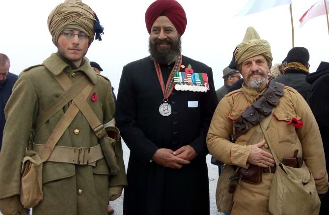 Squadron Leader Chhina at Villers Guislain with Frenchmen in uniforms Indian soldiers wore in the Great War enacting WWI battles.