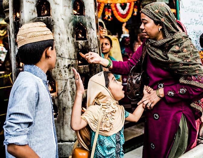 A Muslim woman with her children