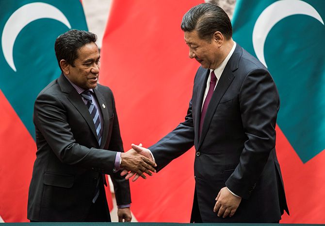 Maldives President Abdulla Yameen greets Chinese President Xi Jinping at the Great Hall of the People in Beijing, December 7, 2017. Photograph: Fred Dufour/Pool/Reuters