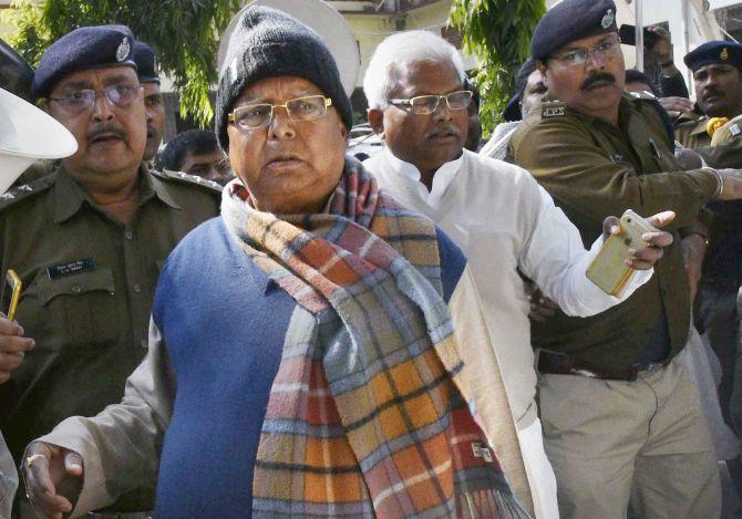 Rashtriya Janata Dal supremo Lalu Prasad Yadav, escorted by the police, after he appeared at the Special CBI court in Ranchi, January 6, 2018. Photograph: PTI Photo