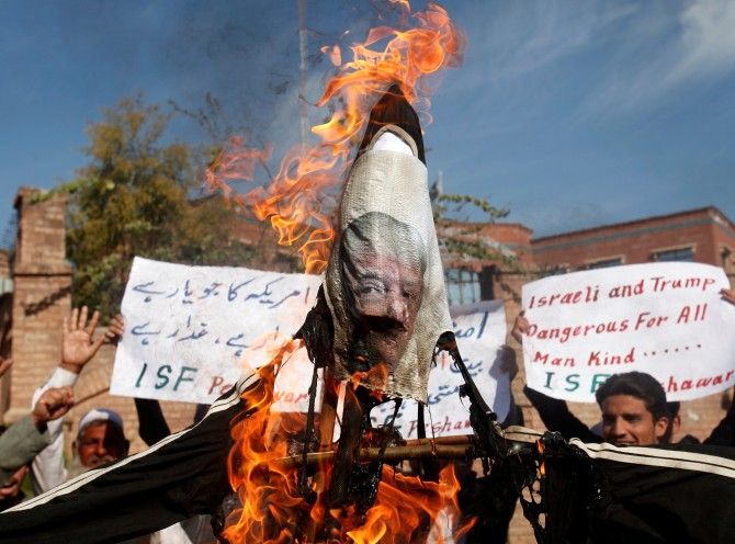 Protesters in Peshawar burn an effigy of US President Donald J Trump in response to his recognition of Jerusalem as Israel's capital, December 8, 2017. Photograph: Fayaz Aziz/Reuters