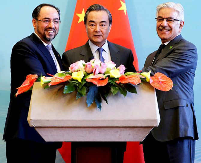 Afghan Foreign Minister Salahuddin Rabbani, Chinese Foreign Minister Wang Yi and Pakistan Foreign Minister Khawaja Asif at a news conference after the 1st China-Afghanistan-Pakistan foreign ministers' dialogue in Beijing, December 26, 2017. Photograph: Jason Lee/Reuters