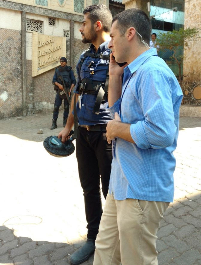 Tense Israeli security personnel survey Hormusji Street, anxious that the location was secure for their leader's visit. Photograph: Vaihayasi Pande Daniel/Rediff.com