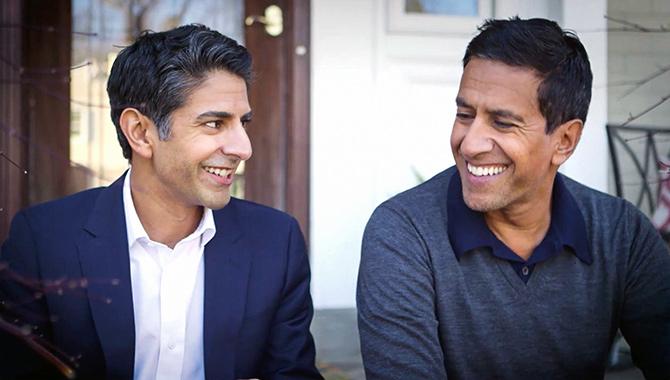 Suneel Gupta, left with his elder brother, CNN's Dr Sanjay Gupta