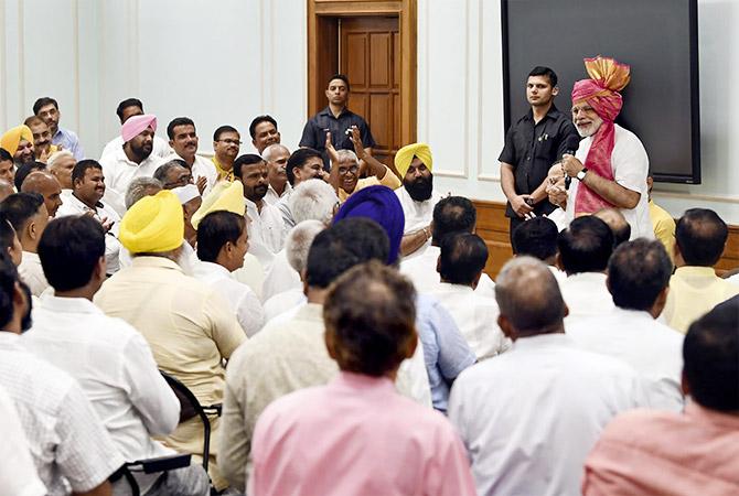 Prime Minister Narendra Damodardas Modi interact with sugarcane farmers, at Lok Kalyan Marg, June 29, 2018. Photograph: Press Information Bureau