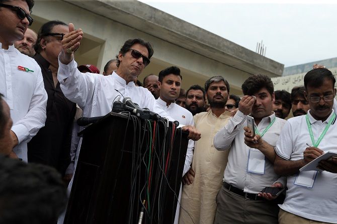 Imran Khan speaks to the media after casting his vote in Islamabad, July 25, 2018. Photograph: Athit Perawongmetha/Reuters