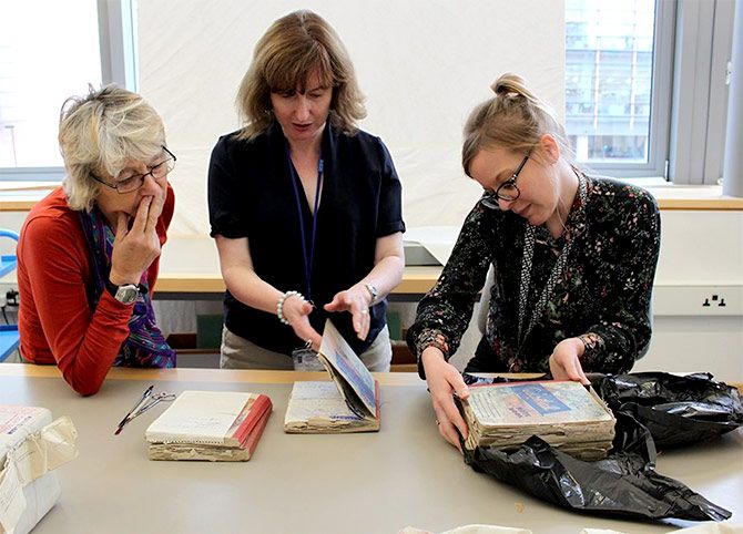 The British Library, who received Ruth Prawer Jhabvala's archives, unwrapping some of her manuscripts that have never been opened since they were stitched into parcels 40 years ago. Photograph: Kind courtesy @BritishLibrary/Twitter