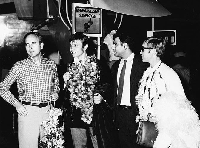 Actor Michael York (second left) and director James Ivory (left) and producer Ismail Merchant (second right), promoting their film 'The Guru' in India, 1967. Photograph Keystone/Hulton Archive/Getty Images.