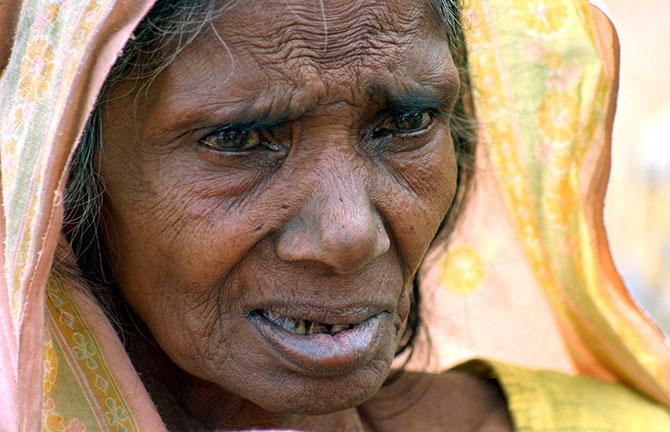 Tara Devi, who suffers from tuberculosis, waits outside a medical centre in Siliguri, West Bengal. Photograph: Rupak De Chowdhuri/Reuters